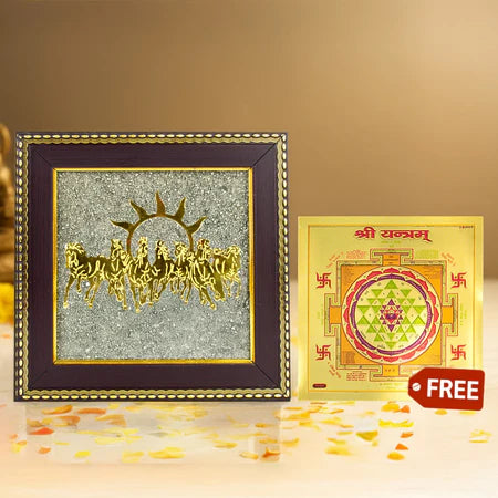 Framed gold Krishna chariot artwork with a free colorful Shri Yantra poster on a beige background